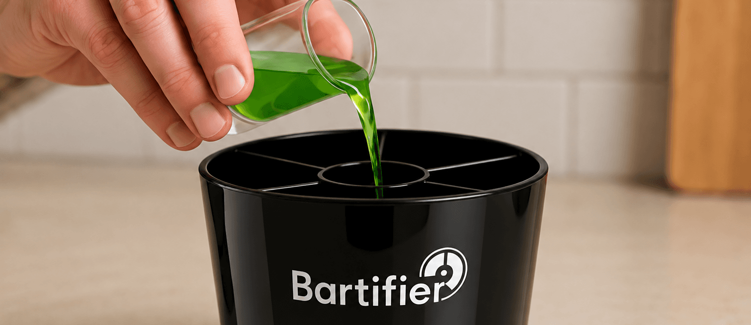 A green ingredient being poured into Bartifier