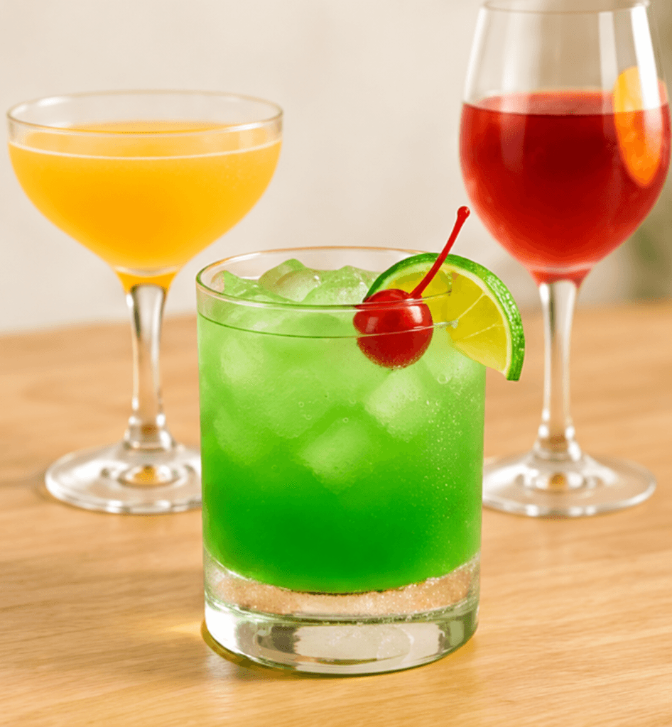 Colorful finished cocktails arranged on a table